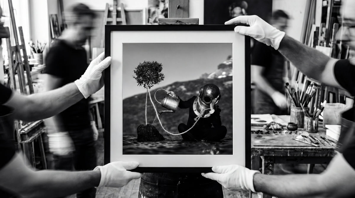 The Noxious Orchard Of Vice, framed, held by gloved hands in the Atelier