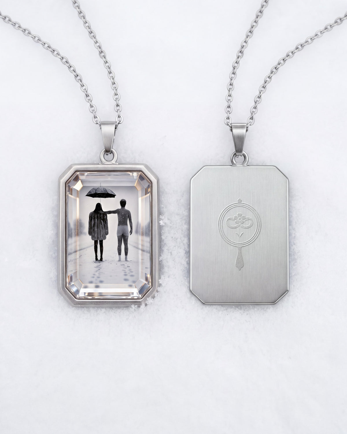 The Winter Between Us, the Amulet by Mirrors by Viulet, front and back, on the snow