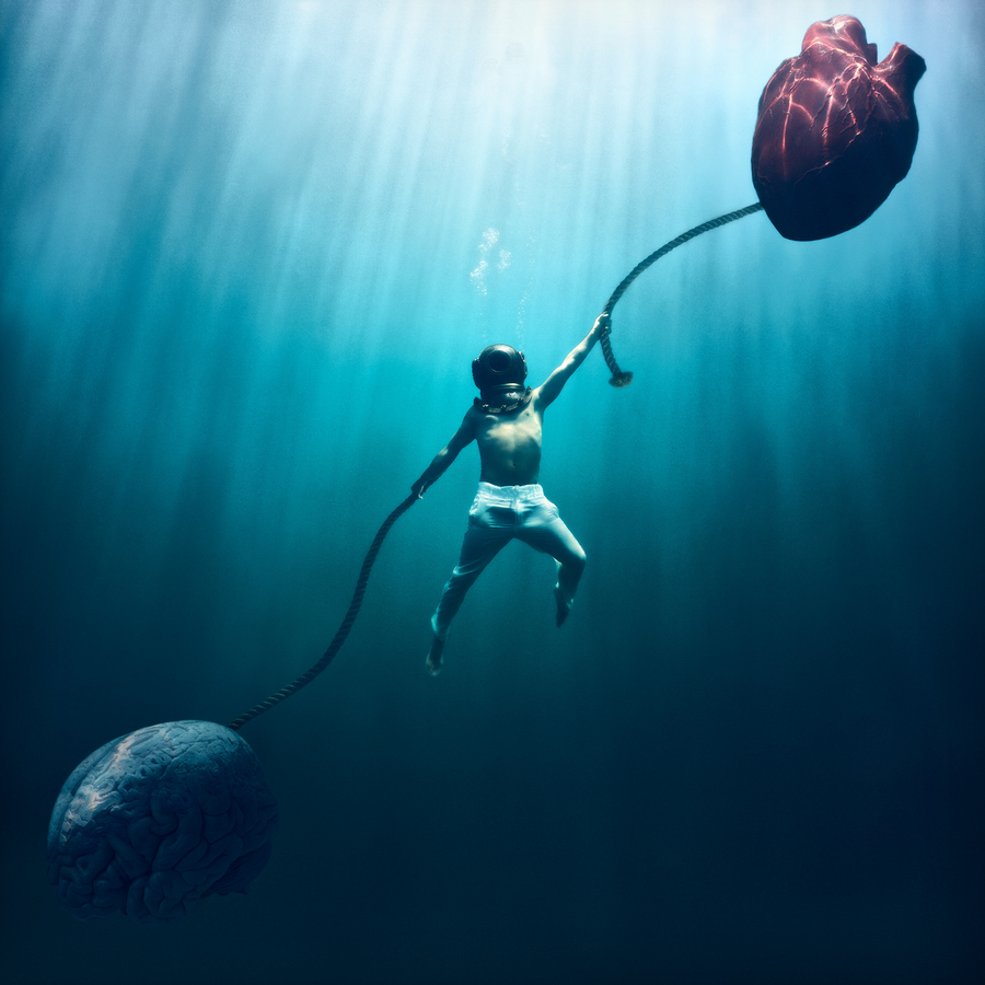 The War Within, a figure underwater between a heart and a mind