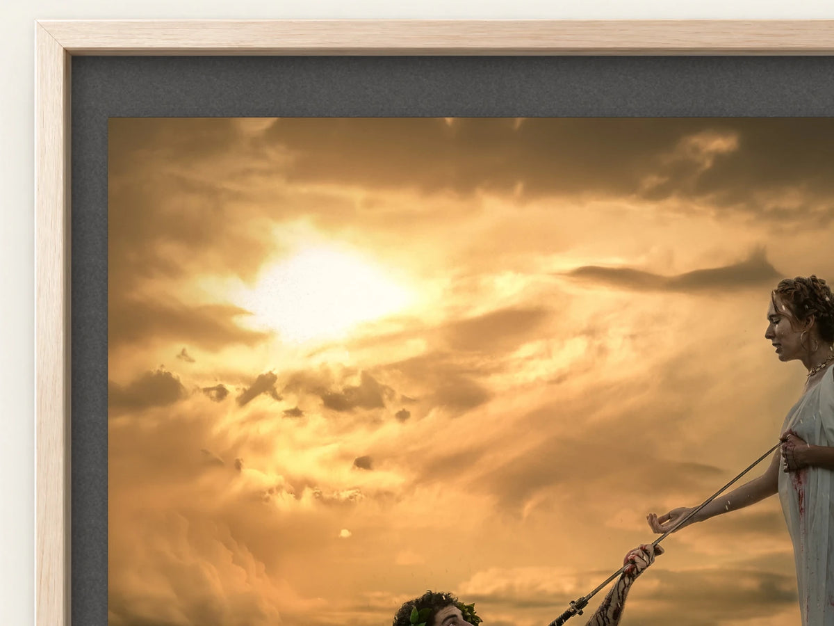 A close view of The Courage of The Coward within its Atelier Wood frame and black mat