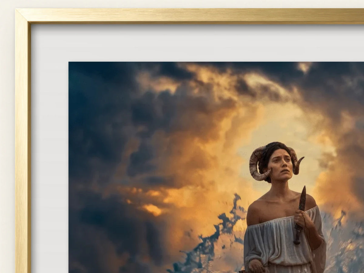 A close view of She Who Chose The Cut within its Midas Gold frame and white mat