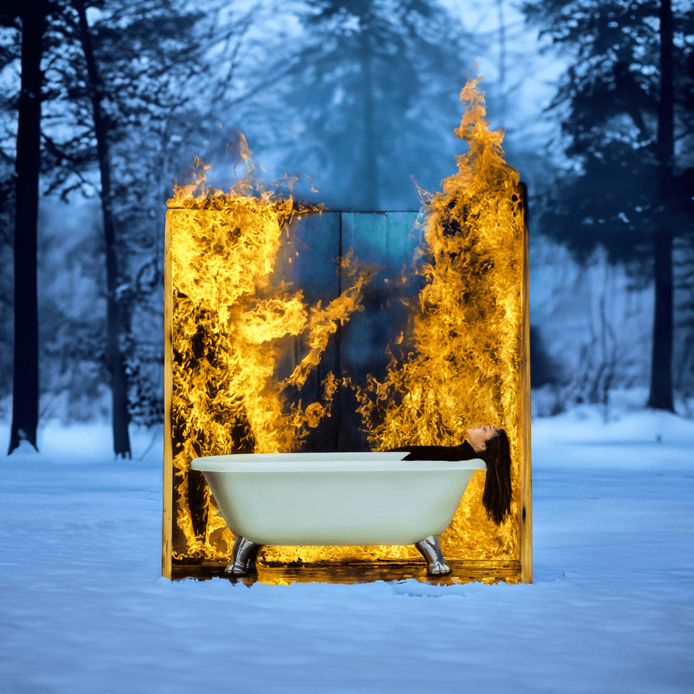 The Girl Who Burned, presented in a black Crowned frame with a cream mat