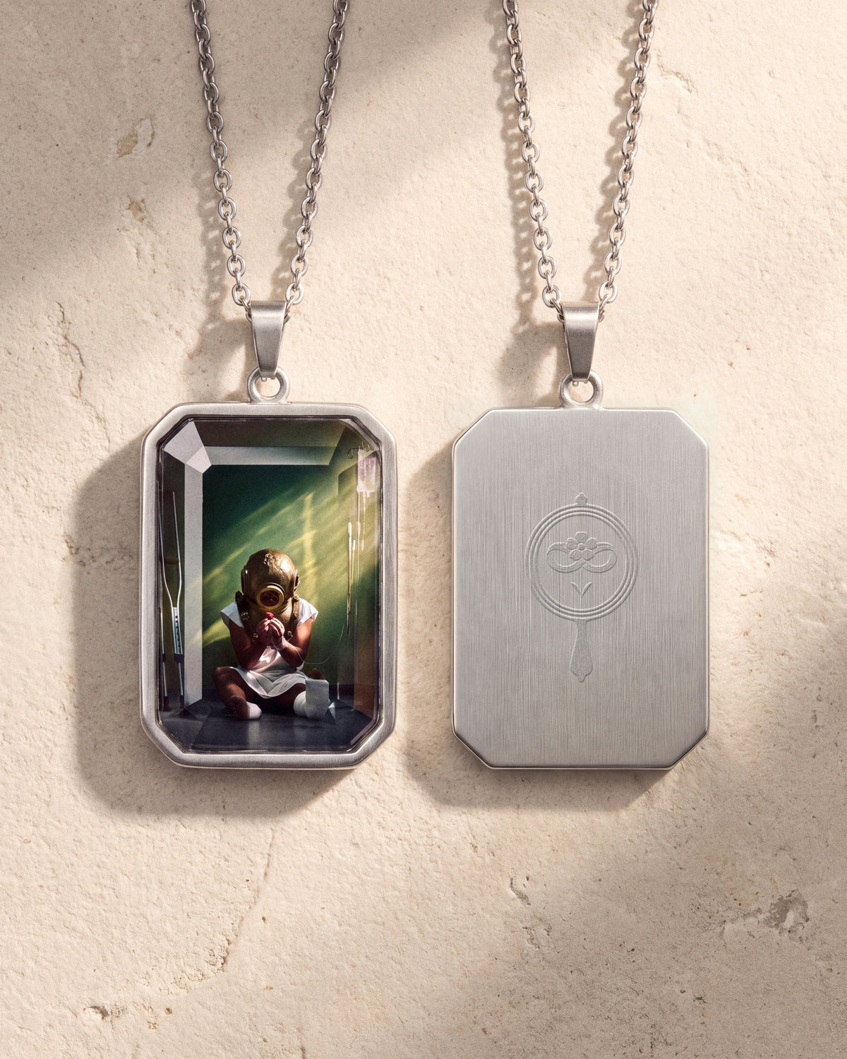 The Strawberry, the Amulet by Mirrors by Viulet, front and back, on warm plaster