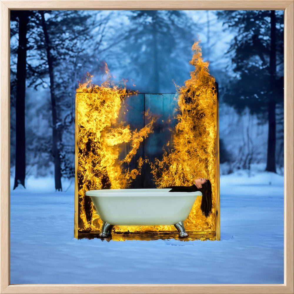 A bath surrounded by flames in a snow-covered forest, presented Lined in Atelier Wood
